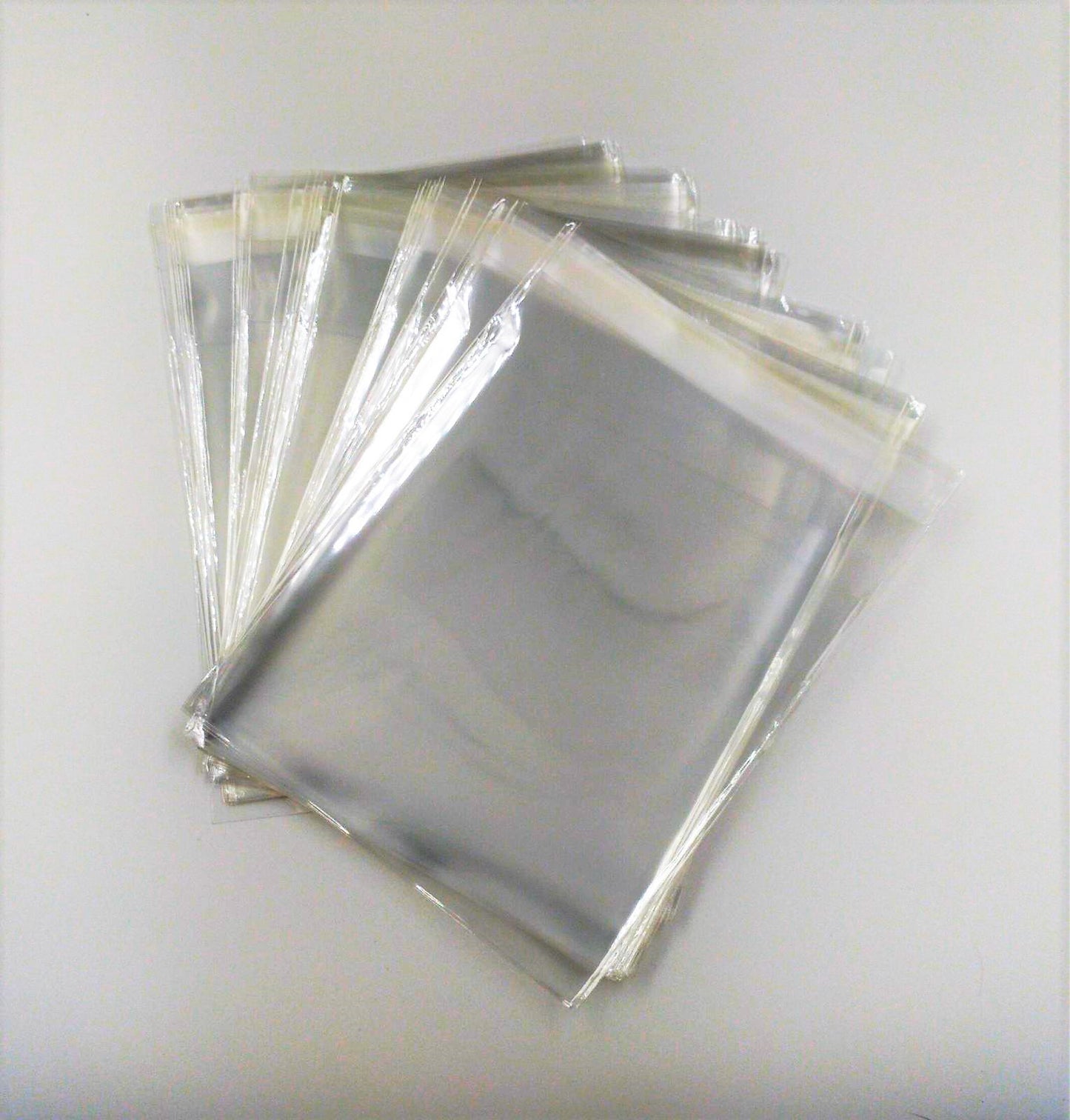 Bustine trasparenti con strip adesivo - cm 11,43*11,43 - (Inches 4,5*4,5) - confezione 1kg